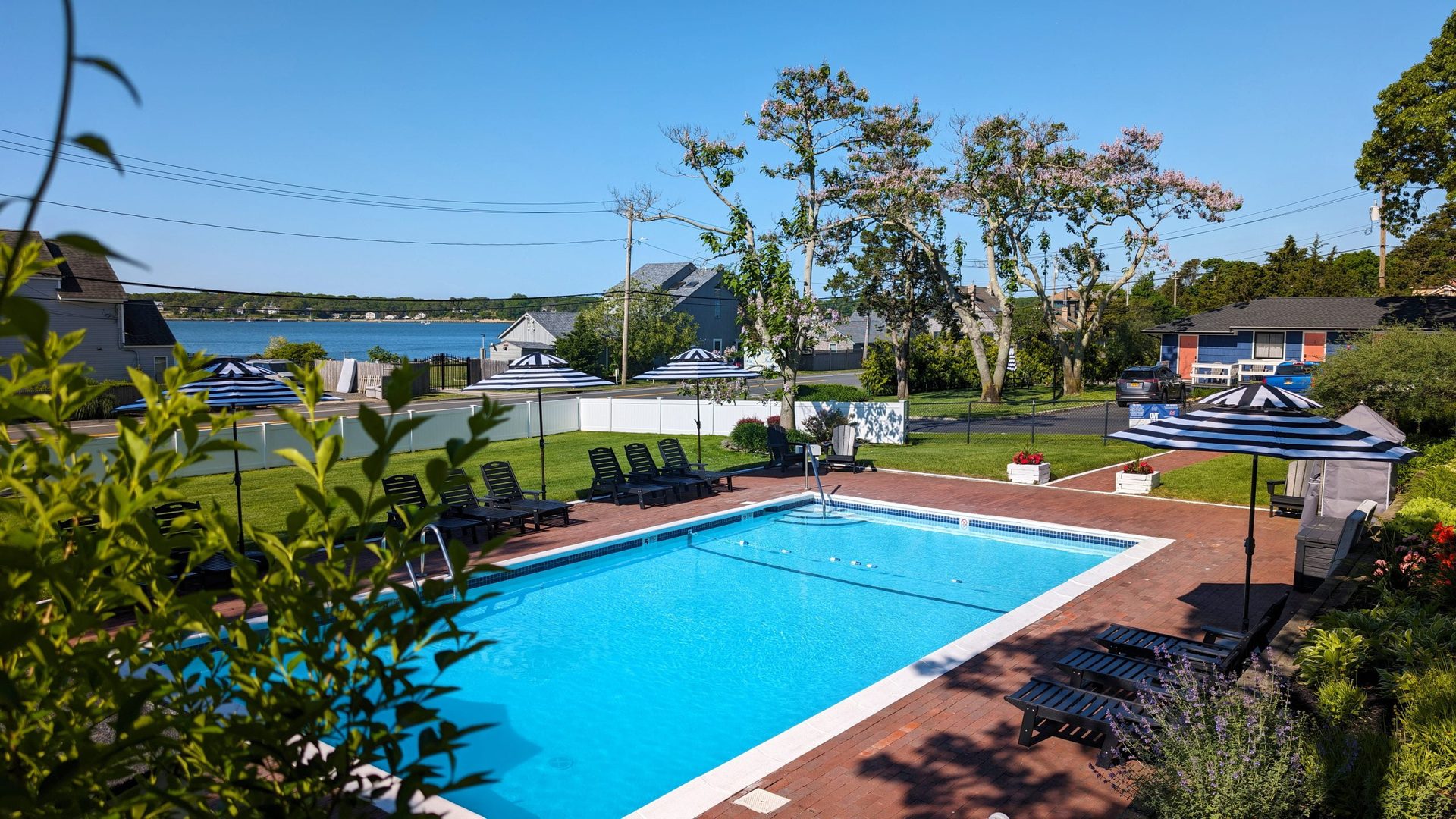 Expanded poolside event area with bay water views at Ocean View Terrace Inn